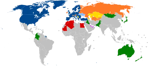 A world map with countries in blue, cyan, orange, yellow, purple, and green, based on their NATO affiliation.