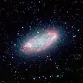 Galaxy NGC 2976 من مقراب سبيتزر الفضائي للأشعة تحت الحمراء