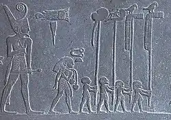 نعرمر يرتدي تاج مصر السفلى على لوحة نعرمر.