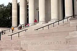 School children entering the Madison Drive NW entrance of the West building
