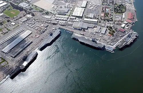 Four carriers (USS&nbsp;Constellation, USS&nbsp;Carl Vinson, USS&nbsp;Nimitz, USS&nbsp;John C. Stennis) at North Island, 2002