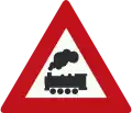 J11: Level crossing without barrier or gates ahead
