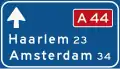 K1: Low level motorway information sign showing both main and intermediary destinations and the motorway number