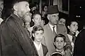 عمر الوعري في أحد الإحتفالات المسيحية في كنيسة القيامة 1955.