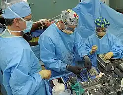 US Navy doctors perform an open reduction internal fixation operation on the femur.