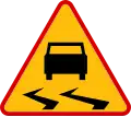 Poland slippery pavement sign.