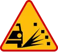 Poland loose chippings sign.