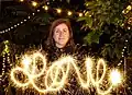 Portrait illuminated by light painting with a ألماسة (ألعاب نارية)