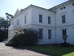 Two-story white building