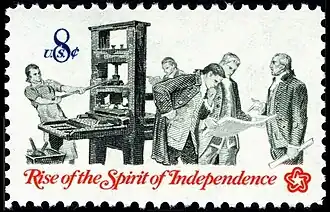 Patriots utilizing a آلة الطباعة while examining a colonial pamphlet