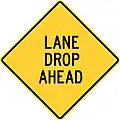 Massachusetts lane drop ahead.