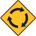 Australian roundabout sign. (note: arrows for driving on opposite side as US/CAN).