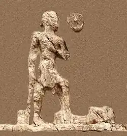 Outline of relief I (extracted). Beardless warrior with axe, trampling a foe. Sundisk above. A name "Zaba(zuna), son of ..." can be read.