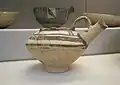 أواخر عصر العبيد؛ جرة ذات فوهة مزخرفة بتصاميم هندسية مطلية بطلاء داكن؛ 5200 ق.م - 4200 ق.م؛ تل المقيّر؛ المتحف البريطاني