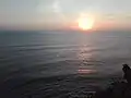 منظر الغروب في المحيط الهندي بصورة ملتقطة من معبد أولواتو.