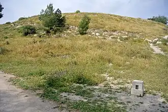 التل