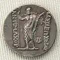 بوسيدون يحمل غصن نخيل على ظهر تترادراخما وهي عملة أنتيماتخوس الأول ثيوس Antimachus I Theos، ملك باكتريا (القرن الثاني قبل الميلاد).
