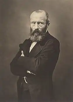 middle-aged man in coat