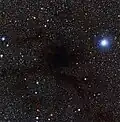 Lupus 4 is a dense pocket of gas and dust where new stars are expected to form.