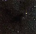 Dark nebula LDN 483 is located about 700 light-years away in the constellation of الحية (كوكبة) (The Serpent).