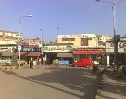 جانب من أماكن معارض الحلويات الشرقية ومحلات الأسماك المملحة التي تشتهر بها تجارة دسوق.