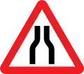 U.K. road narrows on both sides ahead sign.