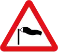 U.K. side winds likely ahead warning sign.