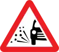 U.K.loose chippings warning sign.