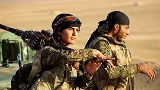 مقاتلة كردية في صفوف وحدات حماية المرأة.