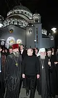 فلاديمير بوتين أمام كاتدرائية القديس سافا