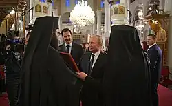 الرئيس الروسي فلاديمير بوتين يهدي القائمين على الكنيسة أيقونة لمريم العذراء