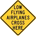 Low flying airplanes cross here sign, Wisconsin.