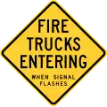 Wisconsin fire trucks entering when signal flashes sign.