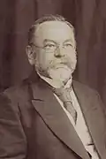 فلهلم بَرتلِمَن (1845-1930) مُصمّم وصانِع كرسي الشاطئ الحدِيث.